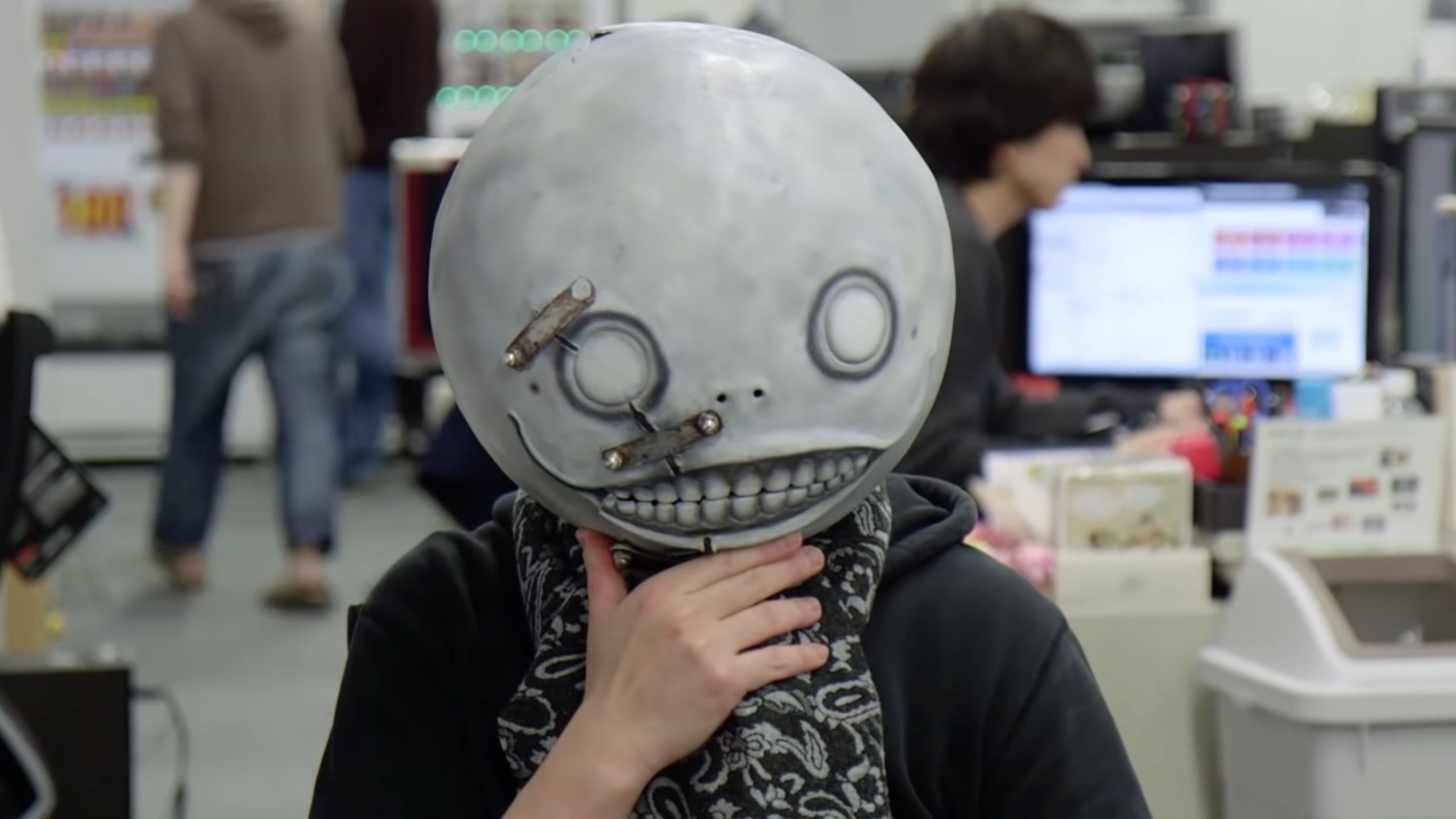 NieR creator insists that his decisions are based on what he thinks will sell, while also quipping that ‘at first I listen to what the publisher wants from me, but later I don’t’