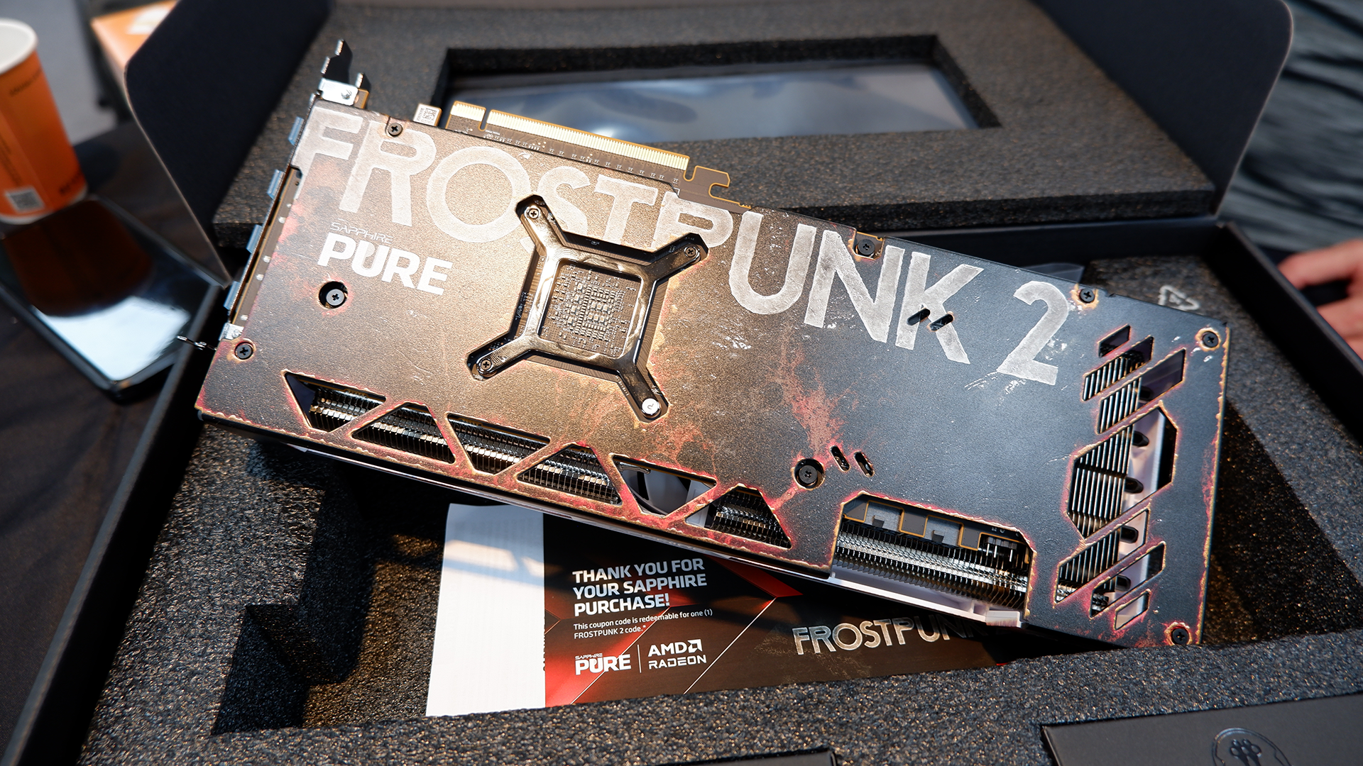 This Frostpunk 2 RX 7700 XT from Sapphire is a promotional card that actually captures the game’s vibe