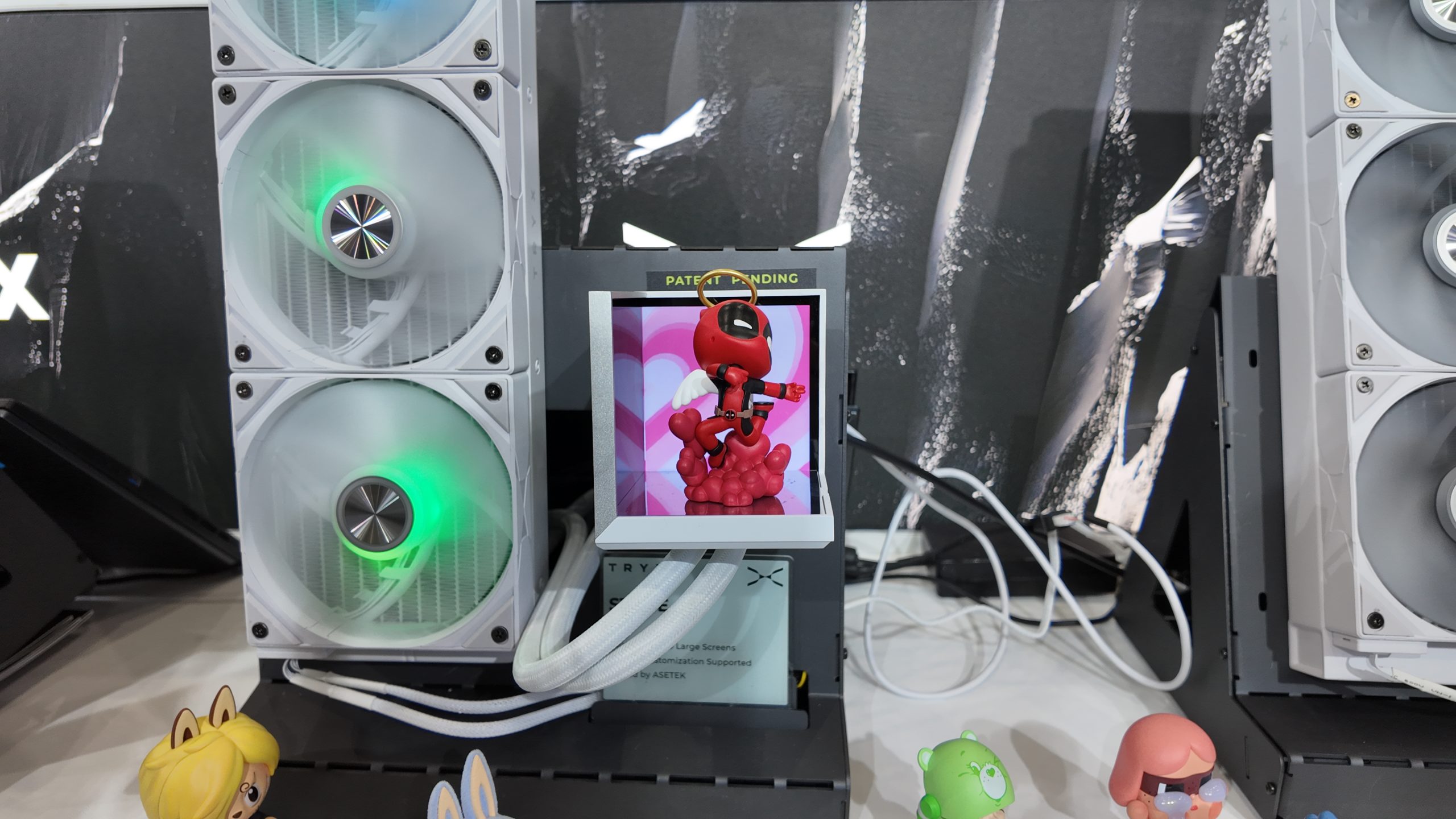 Tryx’s new AIO cooler features two LCD screens and a display shelf, because it’s Computex