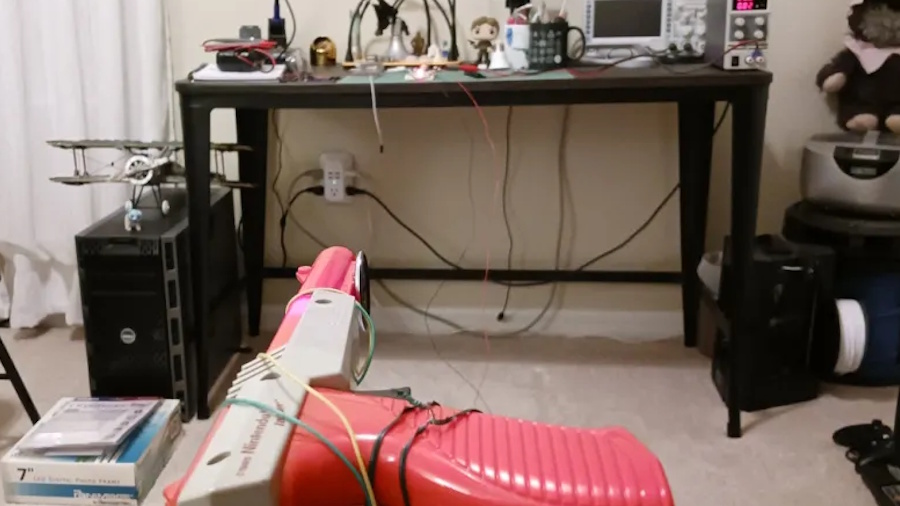 Forget saving thousands for the newest iPhone. One hacker has turned his NES Zapper gun from Duck Hunt into a laser driven wireless phone