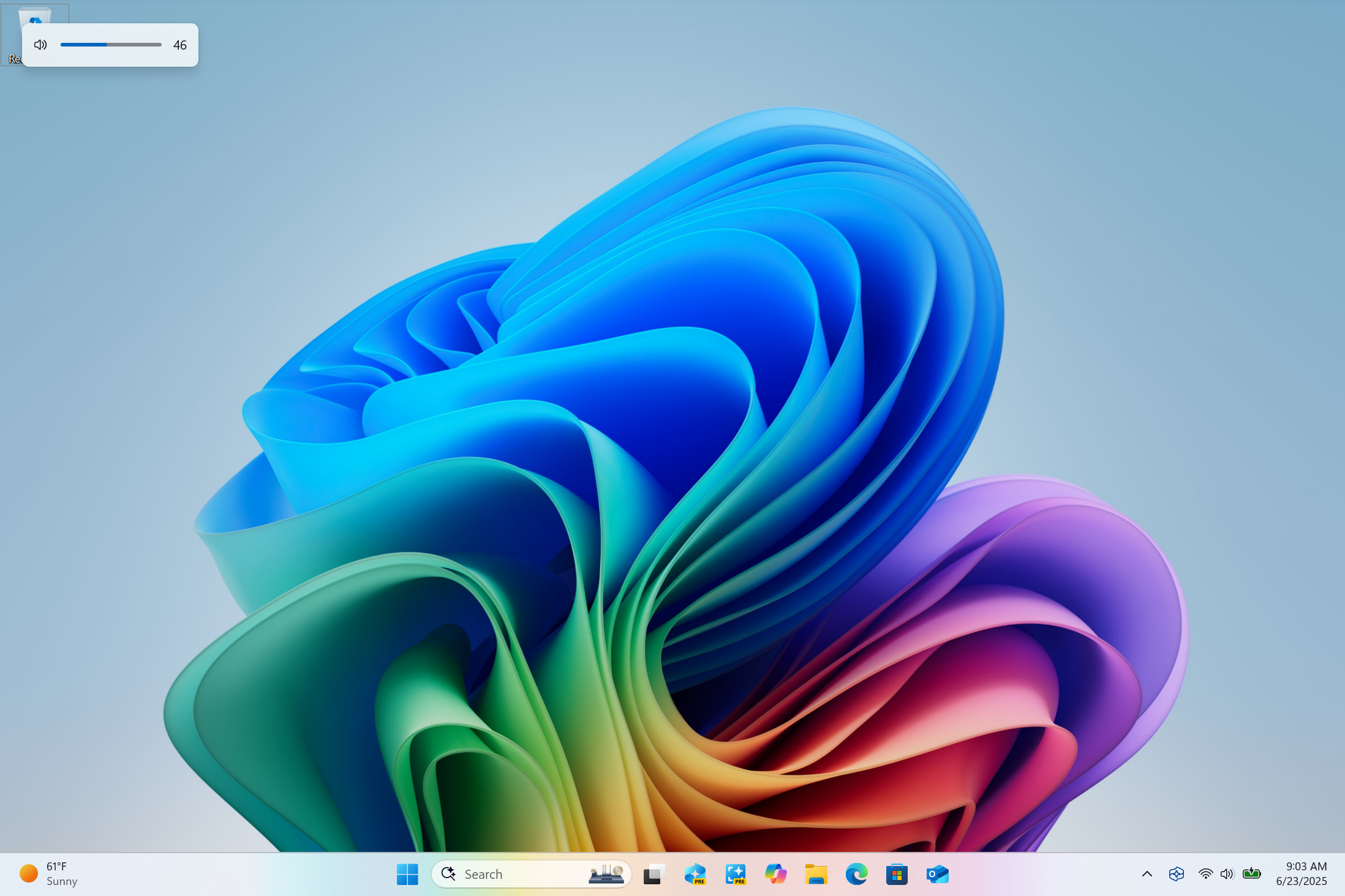 After about a bazillion user requests, Windows finally lets you move the audio volume pop-up