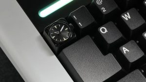 Here’s a keycap that’s also a watch, for the discerning gamer